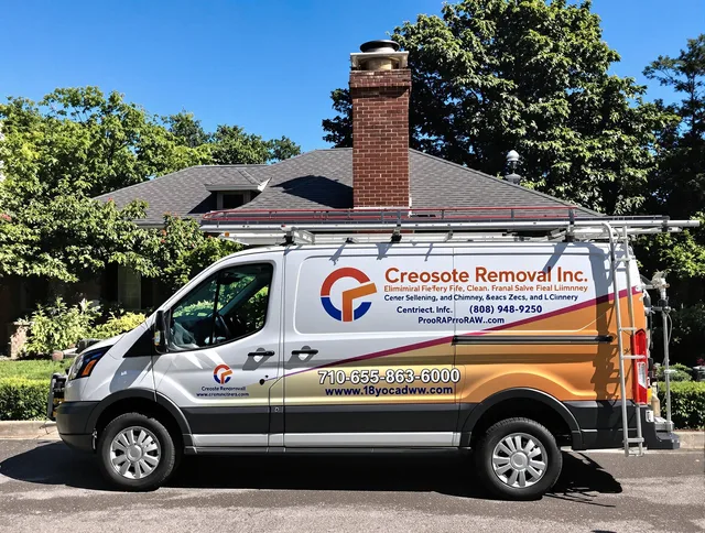 Trumbull Center Chimney Sweep technician removing creosote safely in Trumbull Center, CT