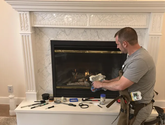 Trumbull Center Chimney Sweep performing fireplace maintenance in Trumbull Center, CT